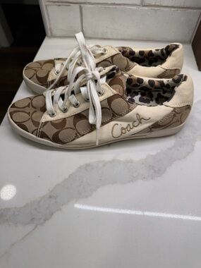 Coach Beige and Brown Signature
Canvas Lace-Up Sneakers - size
8M women's